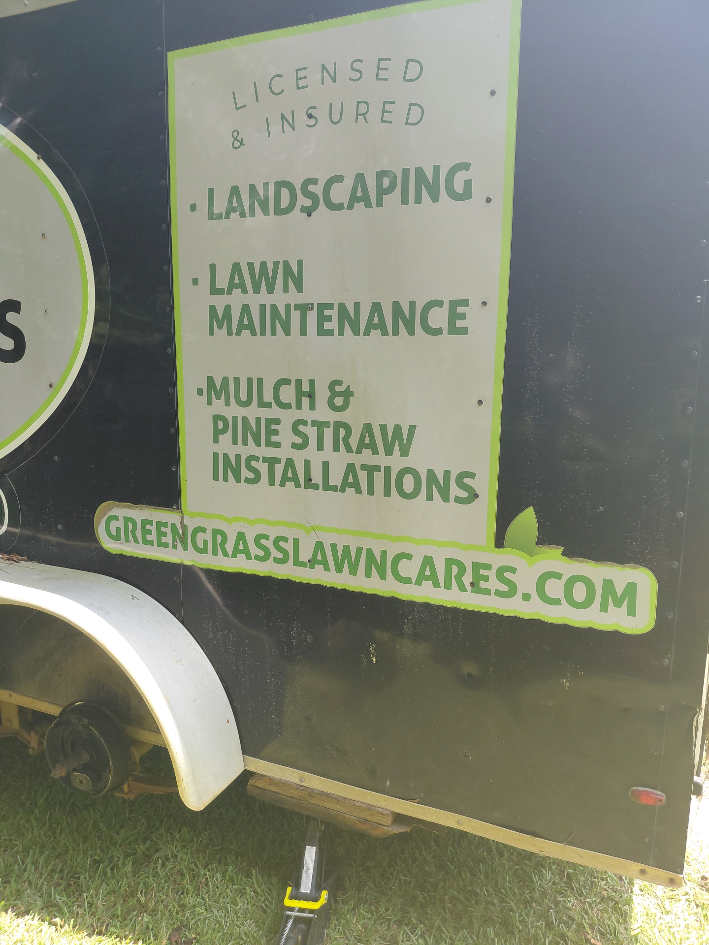 Green Grass Lawn Care branded trailer — Licensed & Insured, Landscaping, Lawn Maintenance, Mulch & Pine Straw Installations
